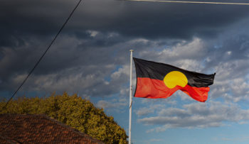aboriginal flag flying above community centre
