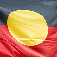 Closeup of Aboriginal flag.