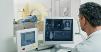 Doctor running a lung CT scan for a patient